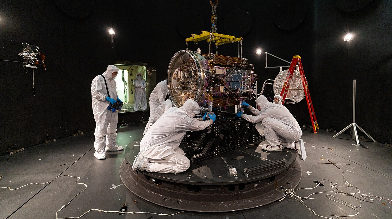 Katalyst engineers attach LINK to a baseplate inside the Space Environment Simulator at NASA Goddard for a test fire of the satellite’s ion thrusters and test operation of one of the robotic arms.