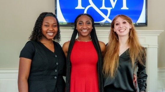 Joy Giramahoro ’28, Madeline Bonhomme ’28, and Sara Smith ’28