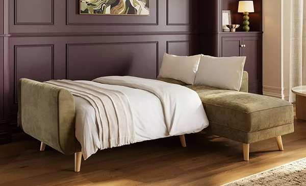 a bed with a chaise longue a bed with a chaise longue