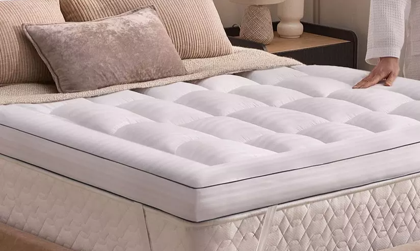 a bed with a chaise longue a bed with a chaise longue