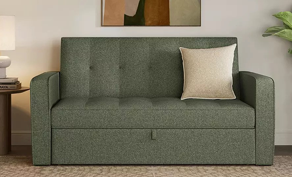 a couch with a pillow on it a couch with a pillow on it