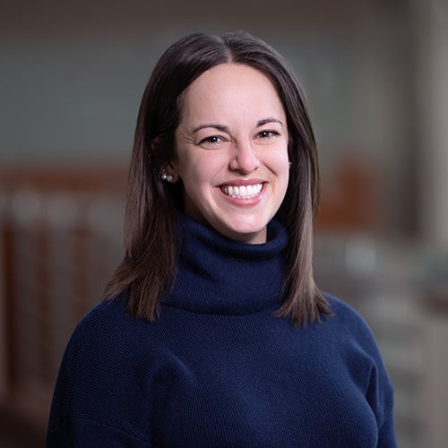 a woman smiling at camera