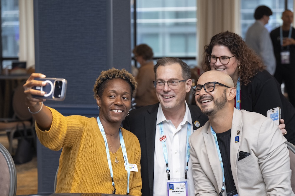 Future Forward attendees taking a group selfie