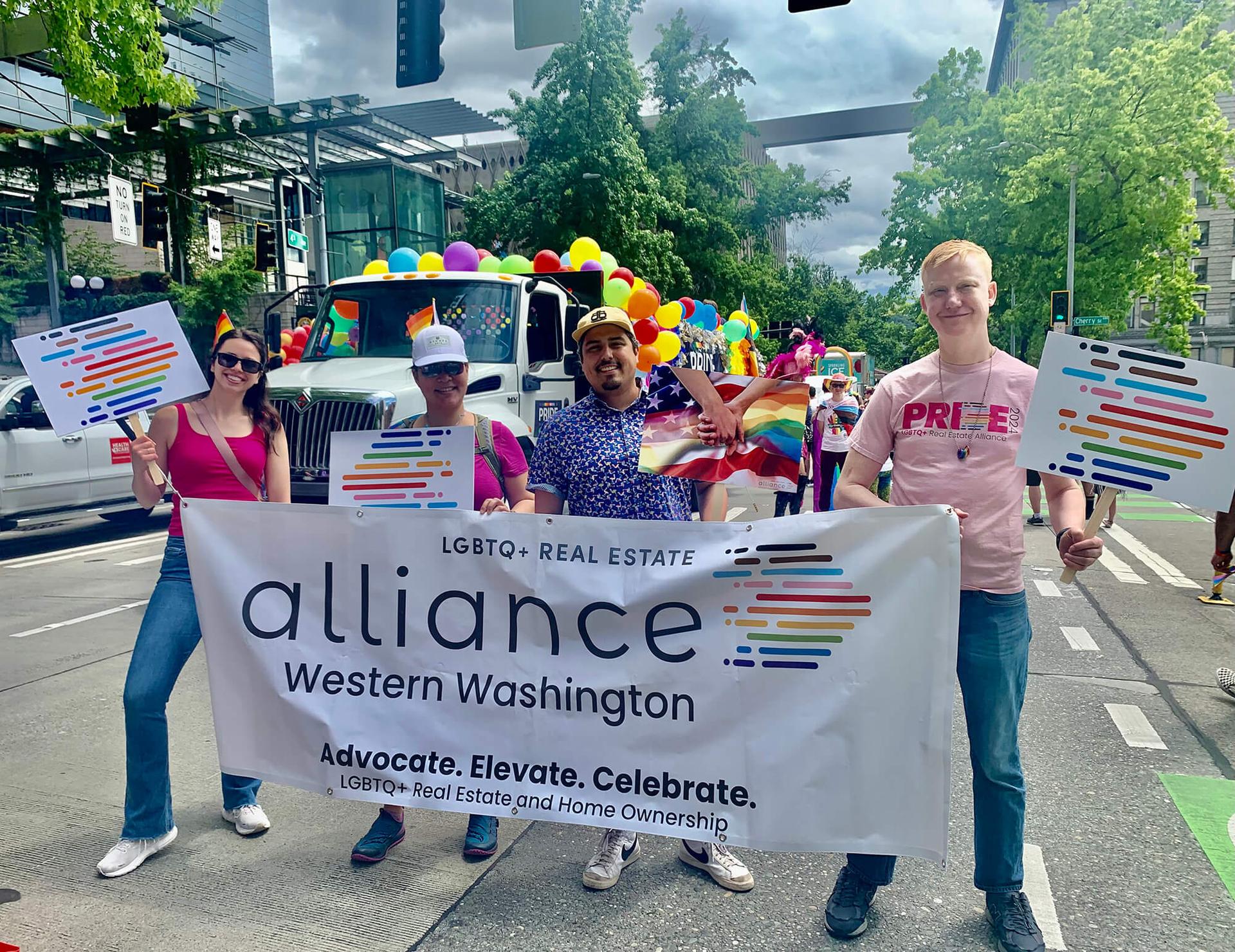 Alliance Western Washington members marching with their banner in the Seattle Pride Parade