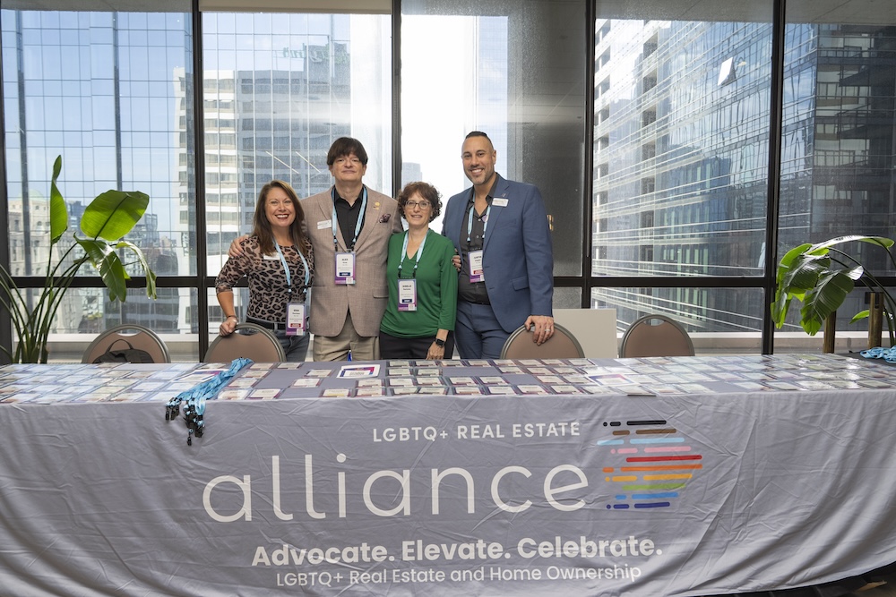 Attendees at the Alliance welcome table