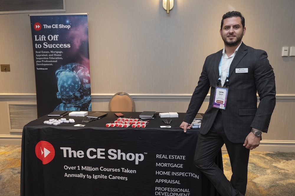 An attendee at The CE Shop sponsor table