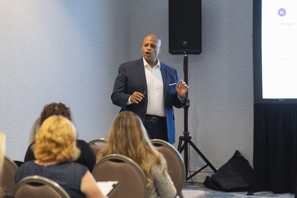 A speaker presenting to a breakout session