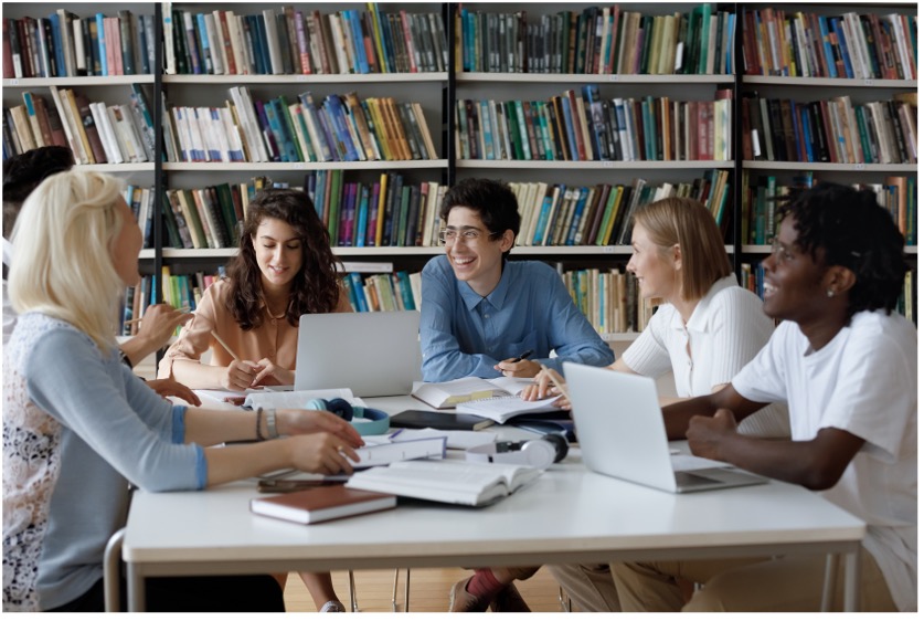 students meeting in library