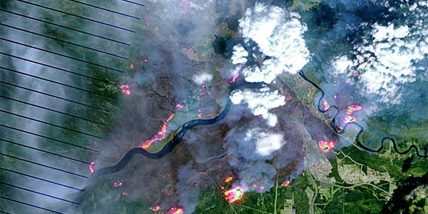 On May 4, 2016, the the Enhanced Thematic Mapper Plus (ETM+) on the Landsat 7 satellite acquired this false-color image of the wildfire that burned through Fort McMurray in Alberta, Canada. 