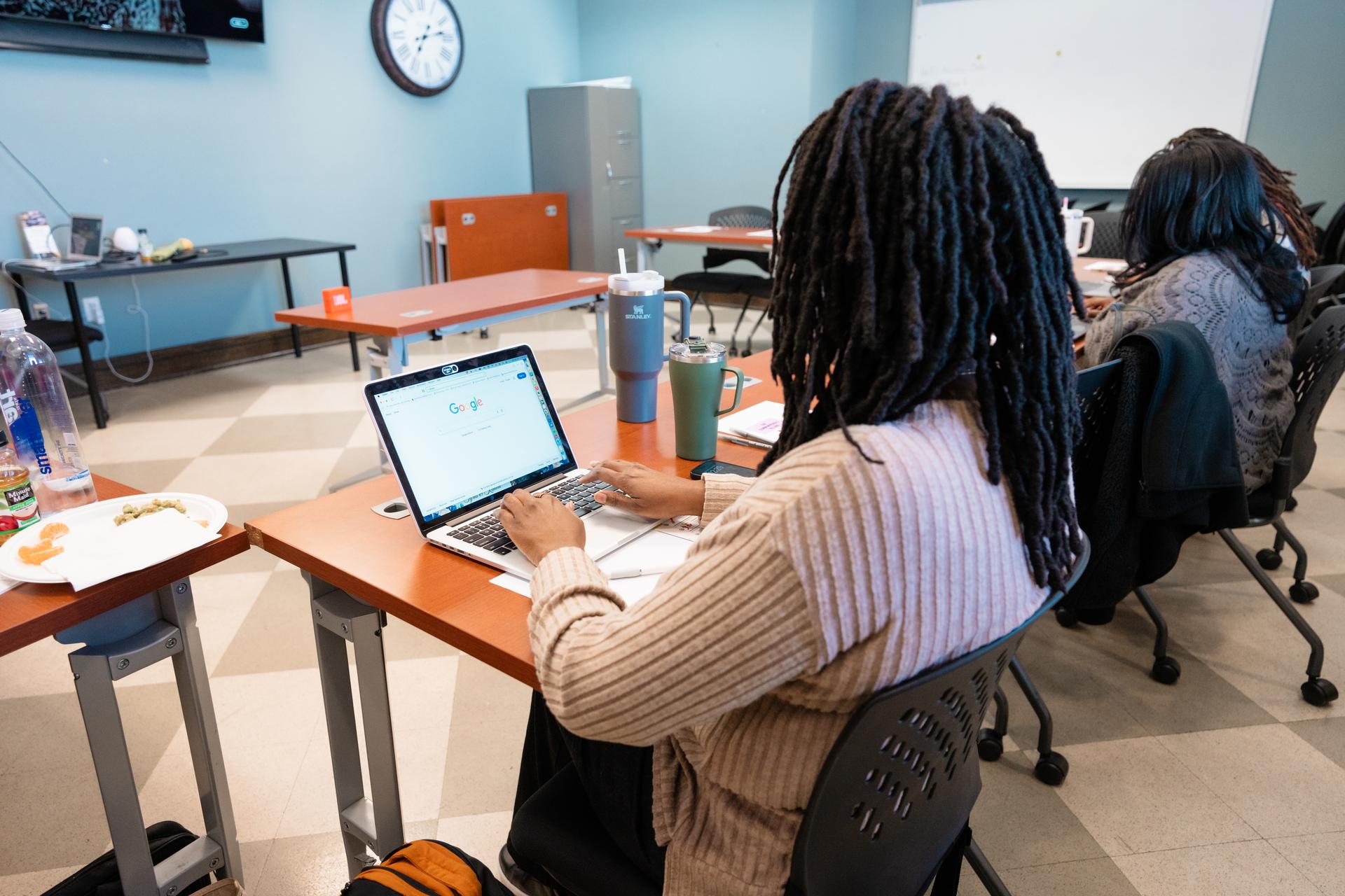 a woman with her eyes closed