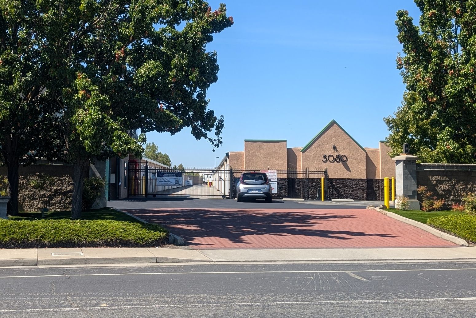 a woman and a boy sitting at a table with colored pencils a woman and a boy sitting at a table with colored pencils