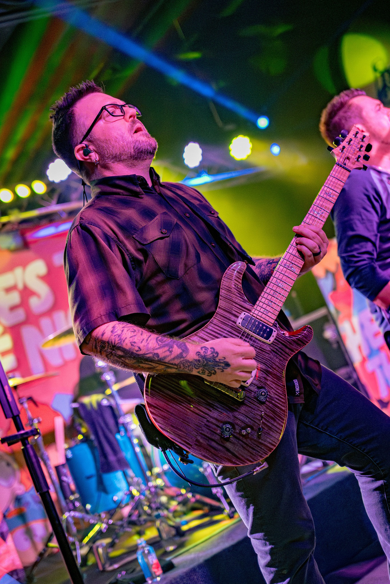 Heres to the night '90s band playing guitar