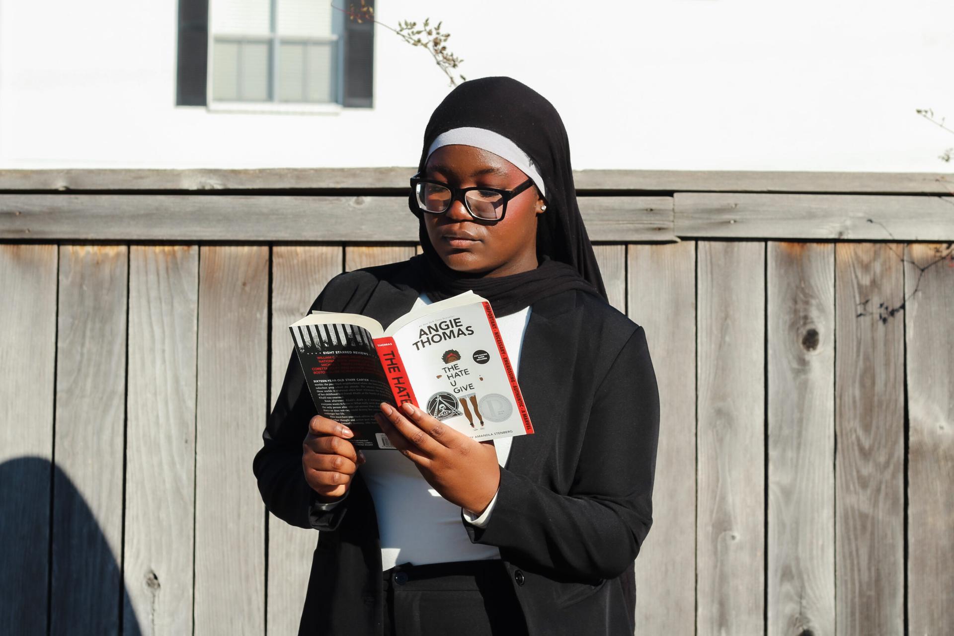 SEAT senior policy associate Azeemah Sadiq reads Angie Thomas’s 