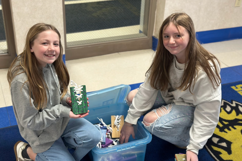Pictured are two MMS Industrial Tech Students Partner with Elementary Schools for Hands-On Service Project