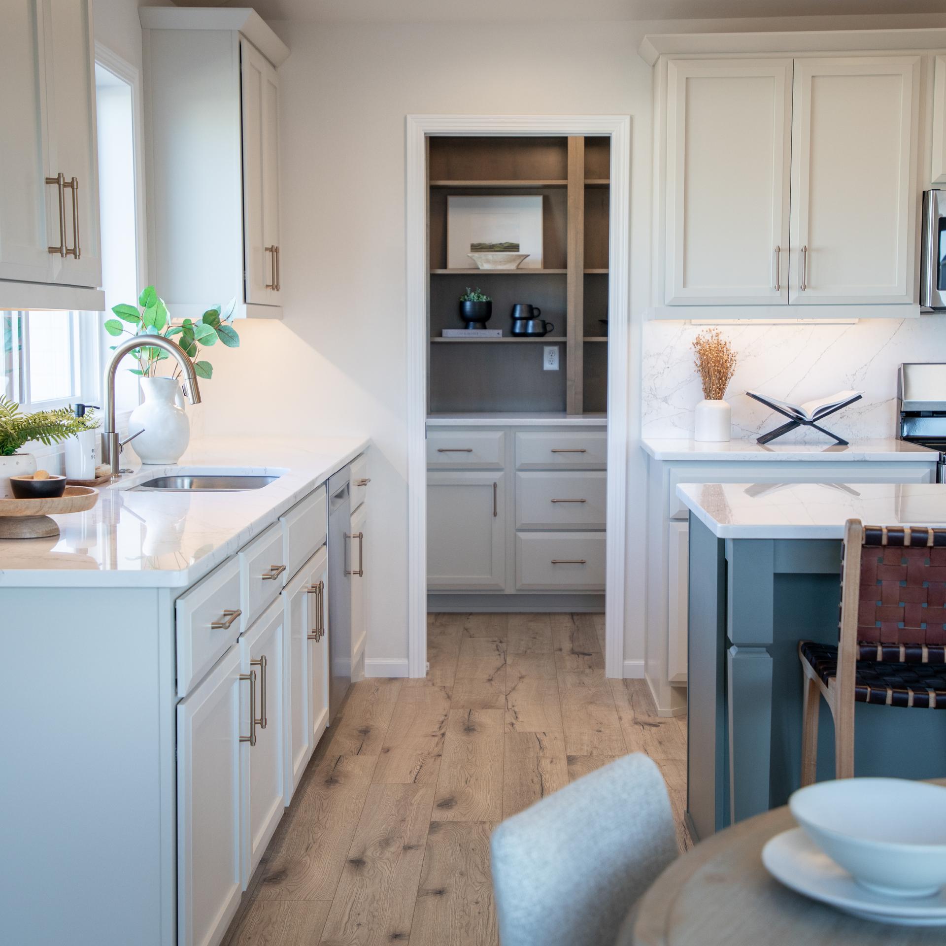 a straw hat and sunglasses on a rock