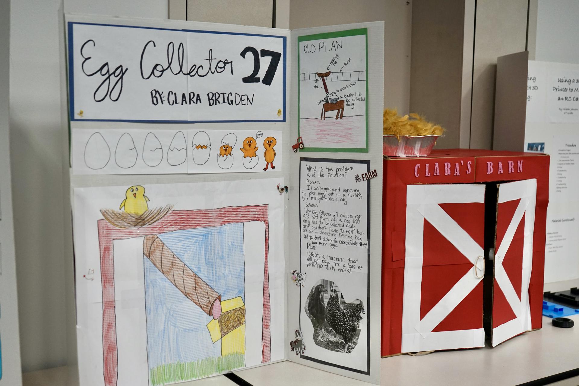 Science fair project board showcasing a students egg collector creation.