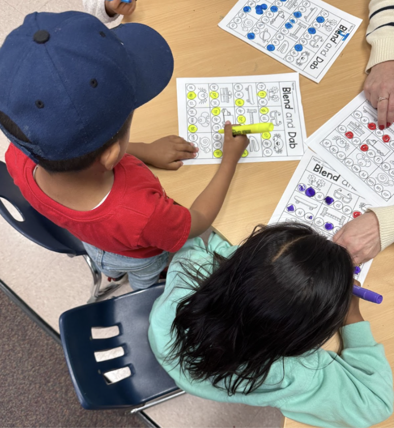 Two students work on an assignment
