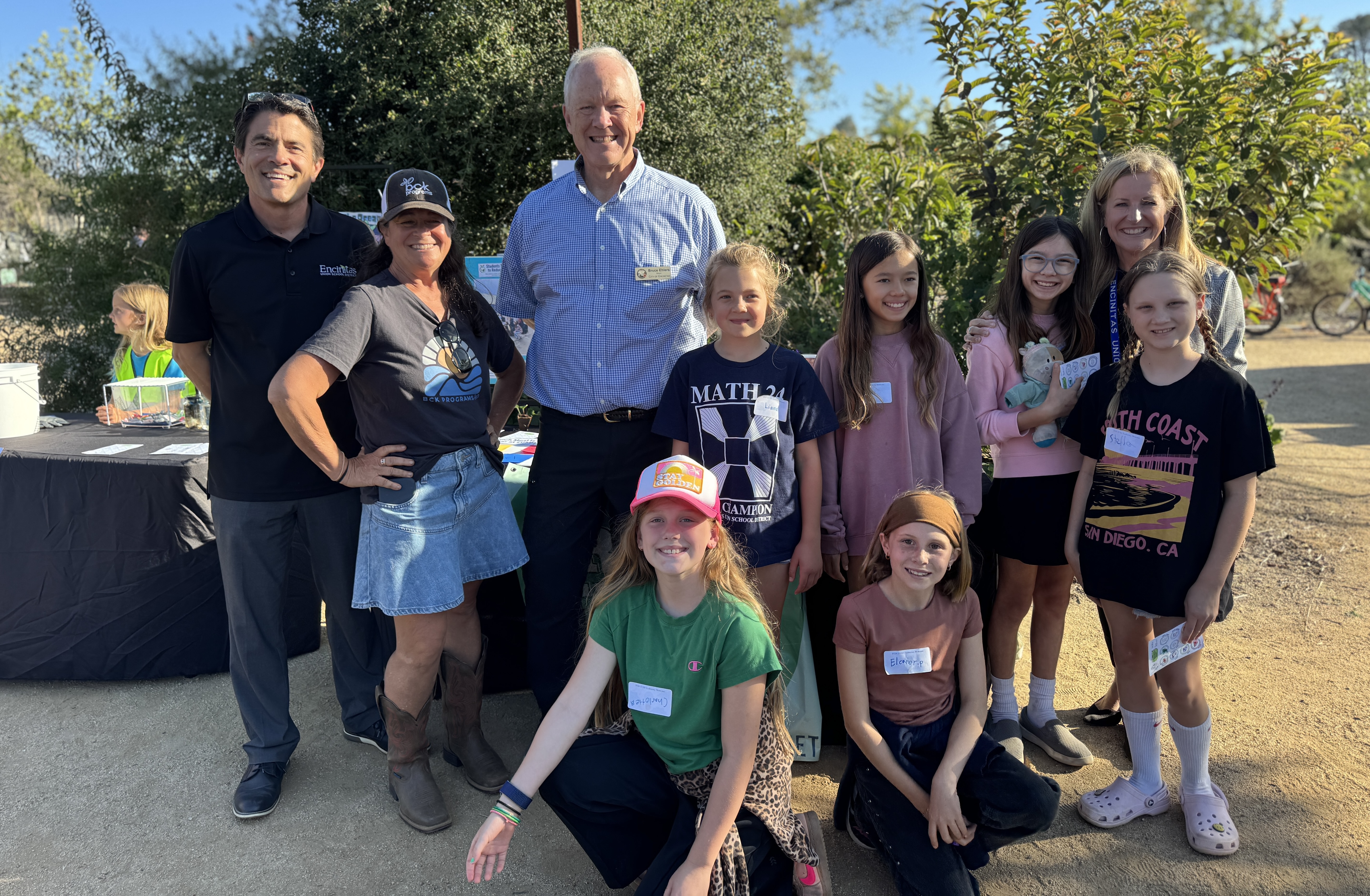 Students stand with Encinitas Mayor Ehlers and Superintendent Dr. Andrée Grey for a photo.