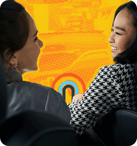 A University Volkswagen Mazda team member speaking with a customer