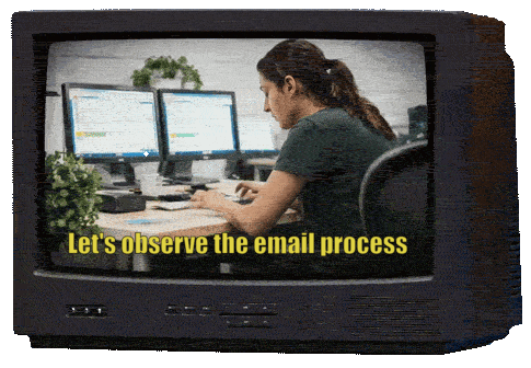 A TV documentary about email makers shows on screen. We can only imagine that Belgian techno anthem, “Pump Up The Jam,