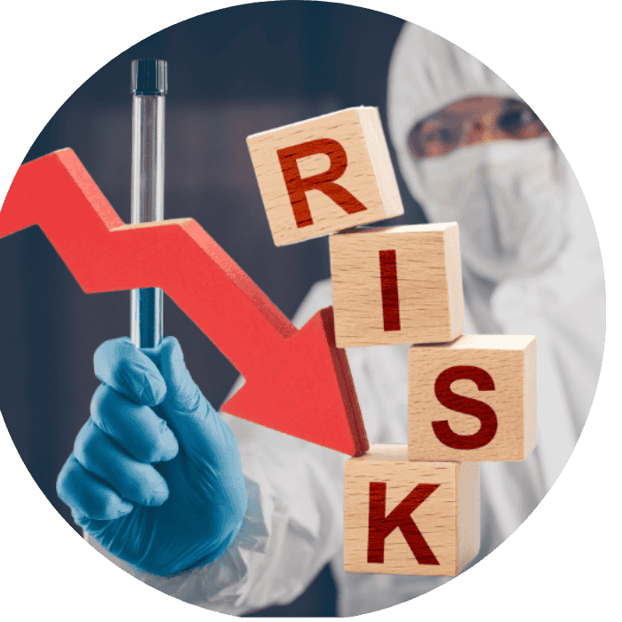 a person in a protective suit holding blocks with red arrow going down