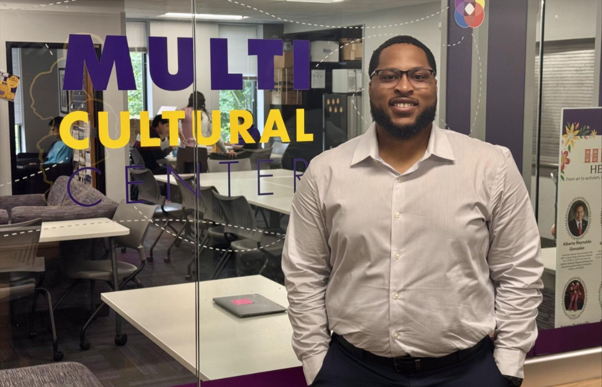 Photo of Andrae Rahming posing in front of the multicultural center.