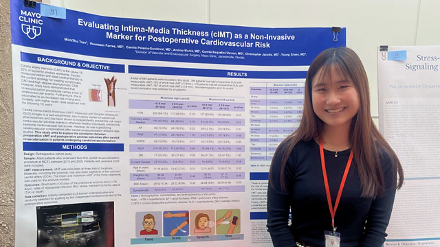 MinhThu Tran stands next to a poster with the title “Evaluating Intima-Media Thickness (cIMT) as a Non-Invasive Marker for Postoperative Cardiovascular Risk”