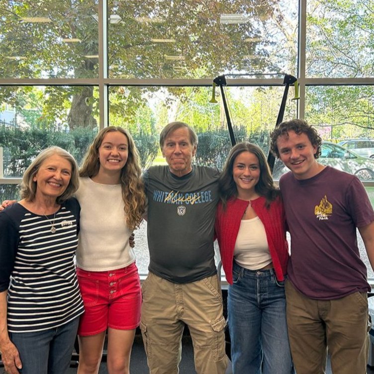 From left: Nancy Mitchell, Riley Cooper, Pat Keef, Ella Shigo and Jackson Garrison smile with arms around each other at the Baker Ferguson Fitness Center
