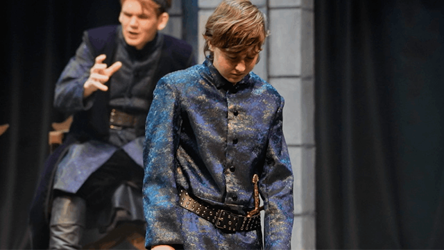 Pan Deines and a fellow actor on stage in a production of “The Winter’s Tale”