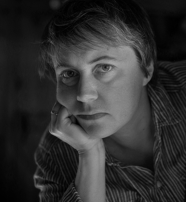 A dark, black and white portrait of Preston Gannaway