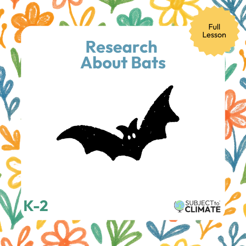 a black bat with a white background with colorful leaves