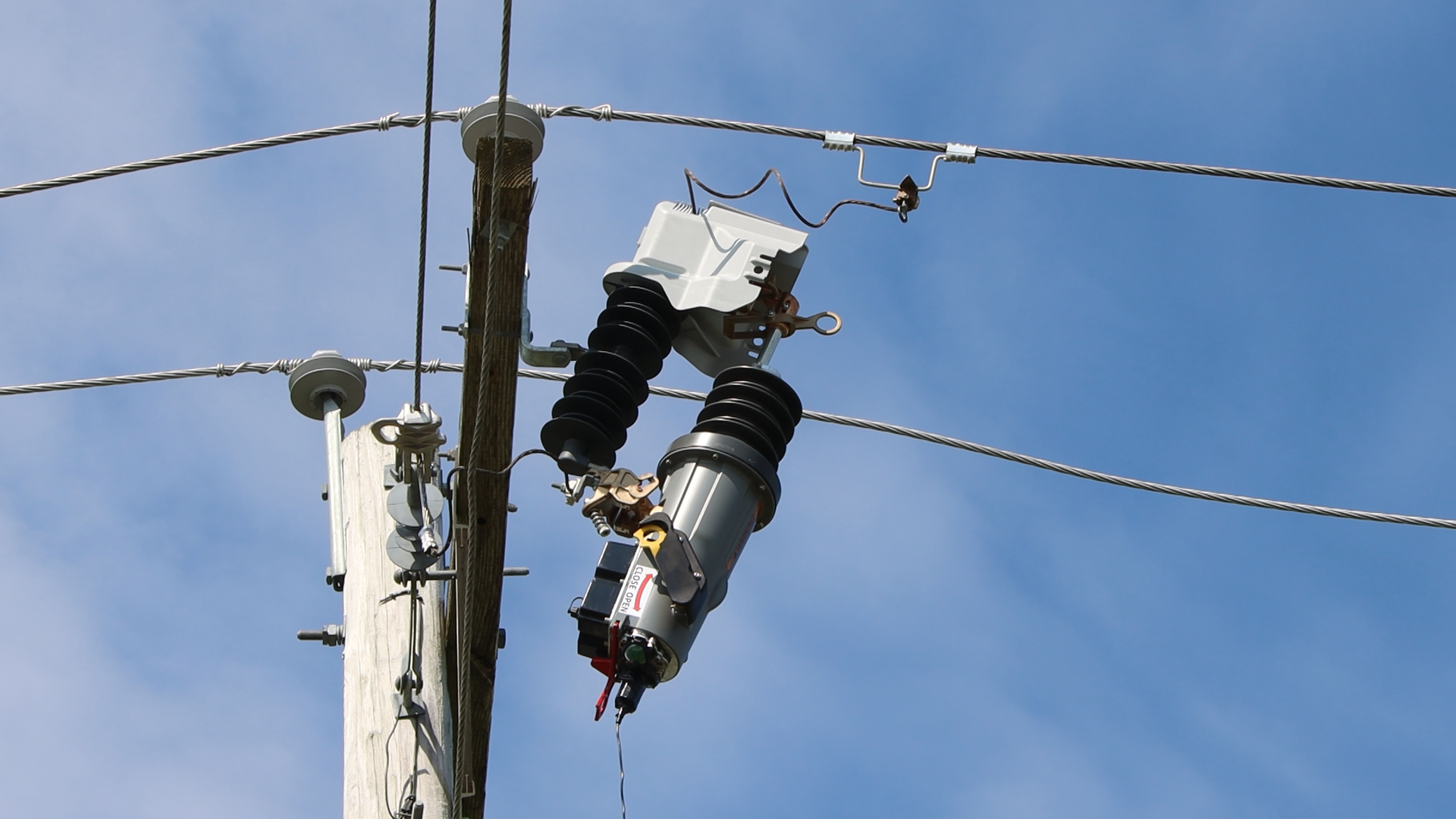 A power line with wires and a power pole