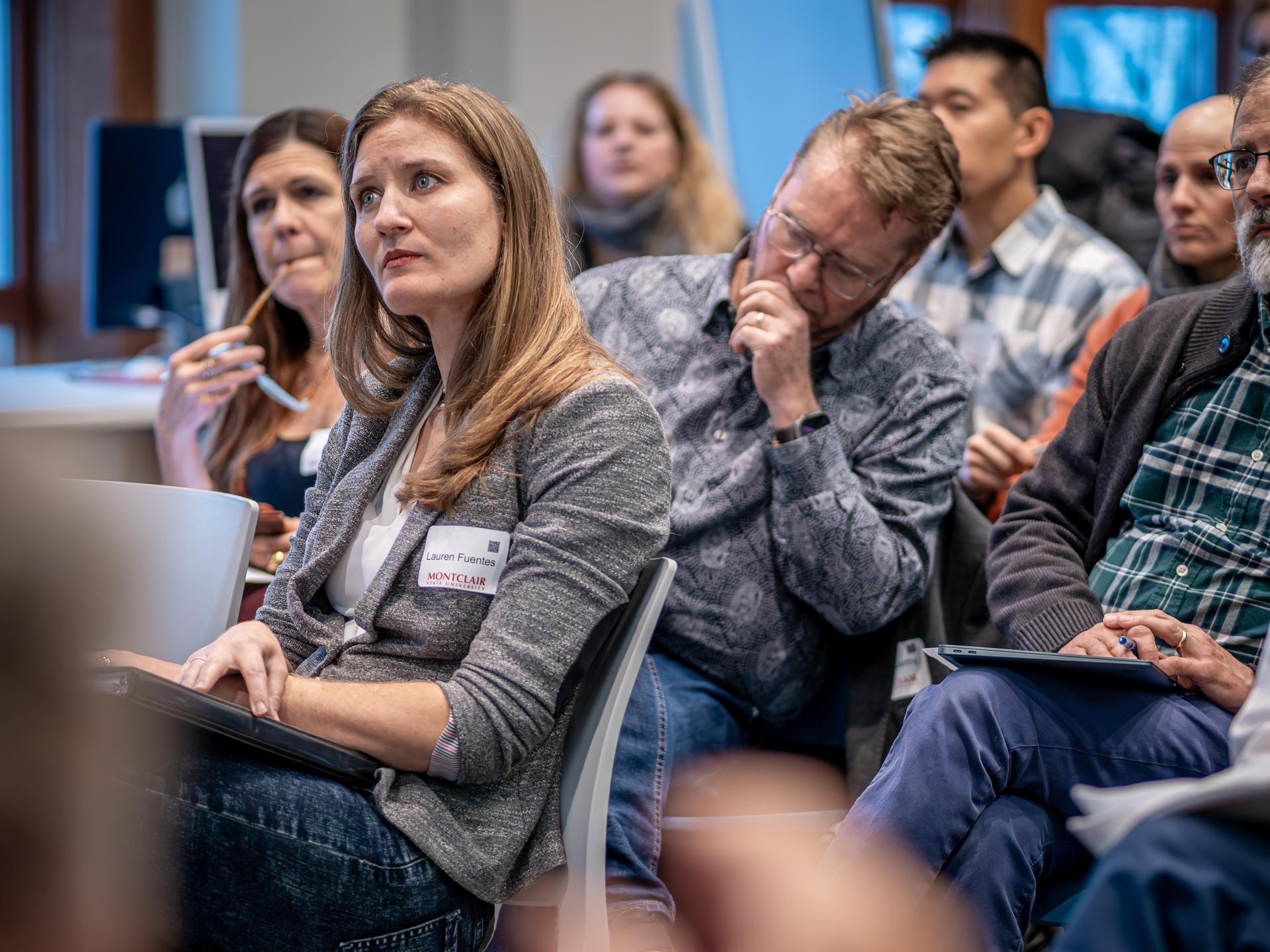 faculty member presenting at a podium