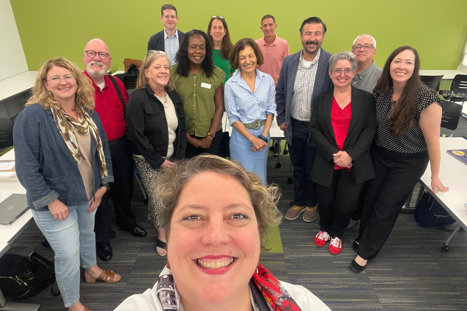 Montclair State University academic deans pose for a selfie with Interim Provost Fatma Mili during a team retreat.