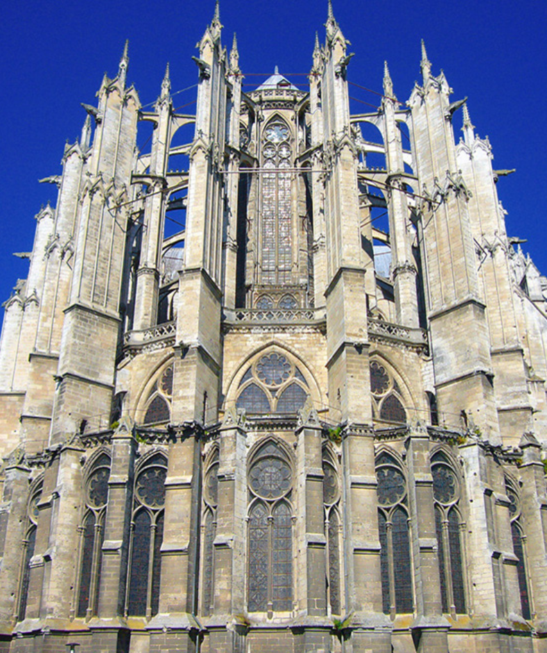 Beauvais Cathedral stands with distinction under a clear blue sky in France.
