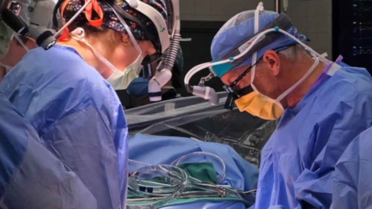 Dr. S. Russell Vester and his daughter, Dr. Hannah Vester performing surgery together