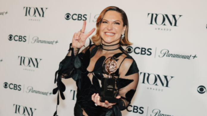 CCM Alum Shoshana Bean holding her Tony award
