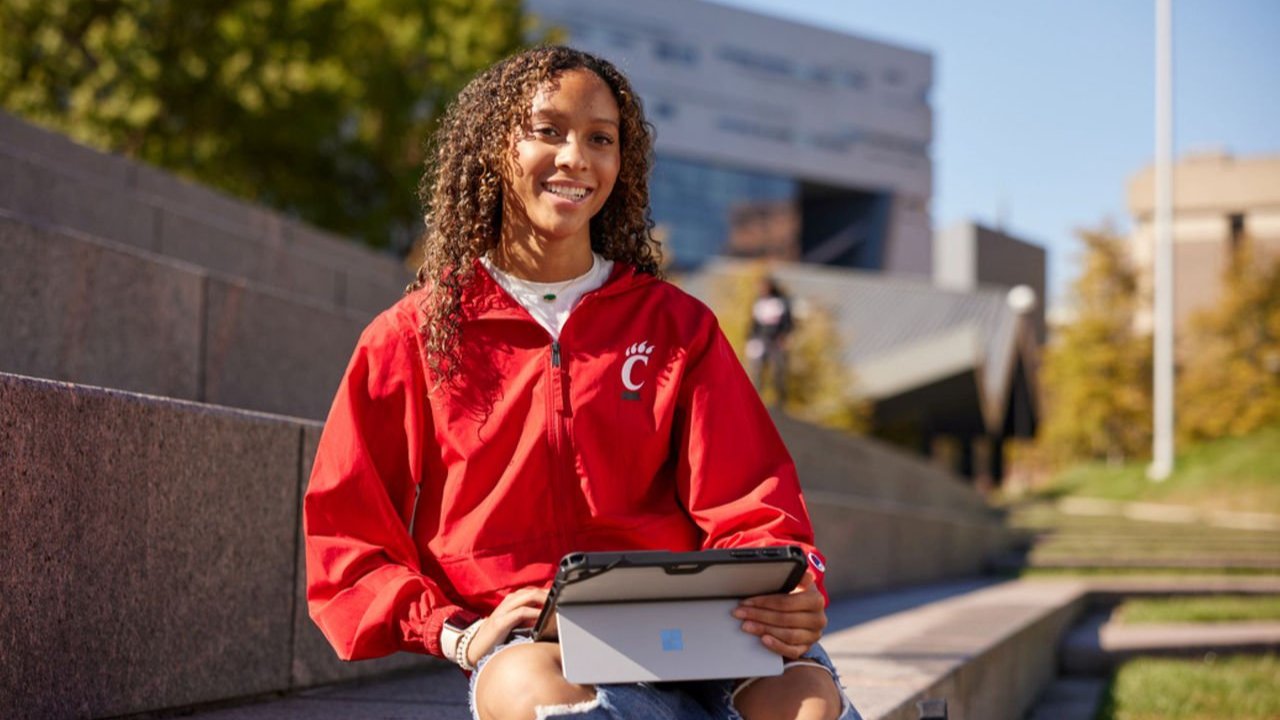 Student sitting campus steps