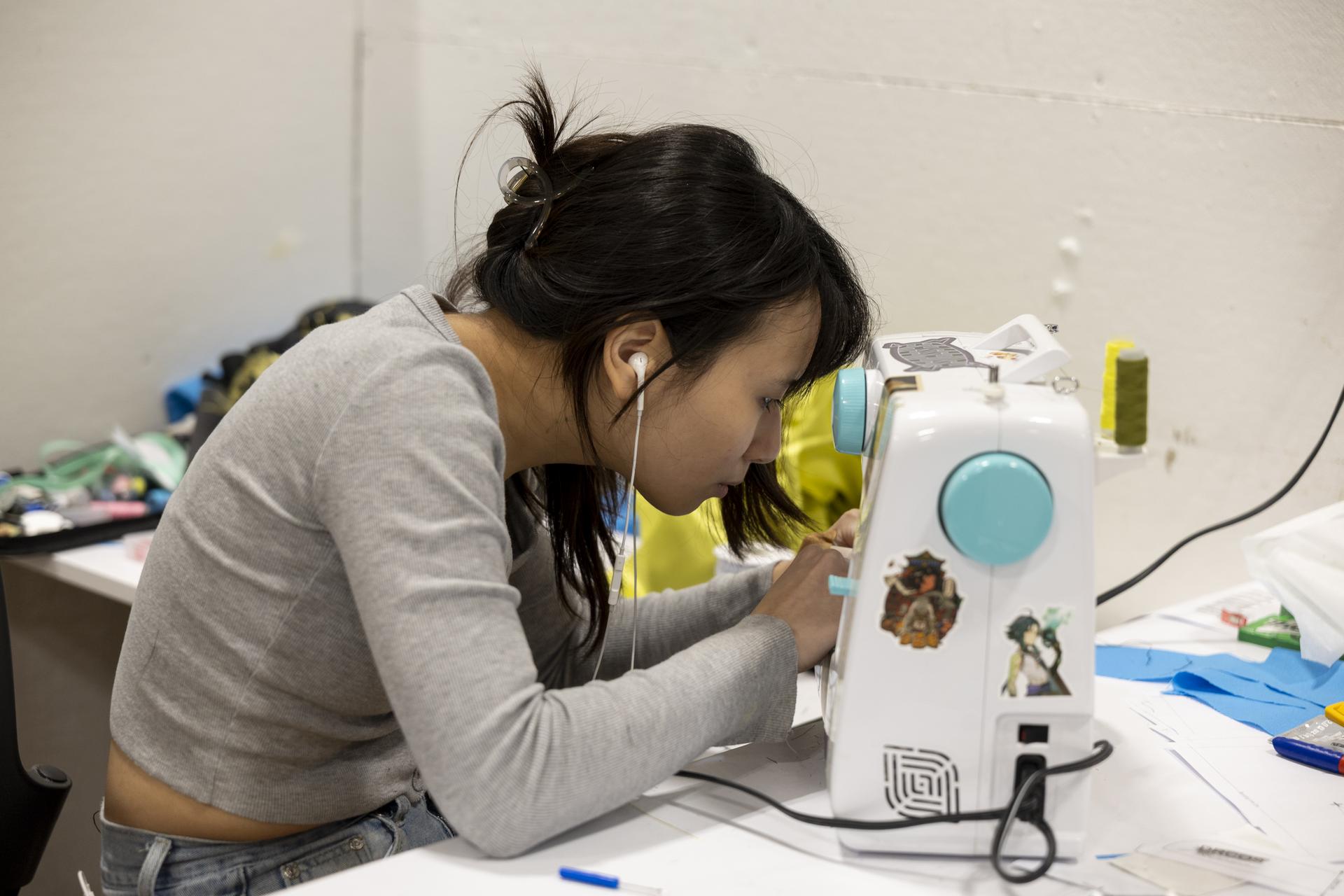 Student using a sewing machine
