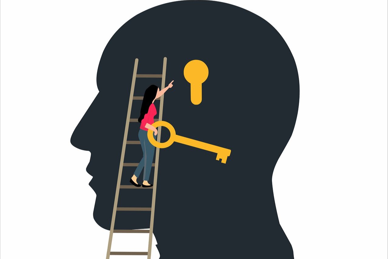 A woman climbing a ladder to a key to a human head.