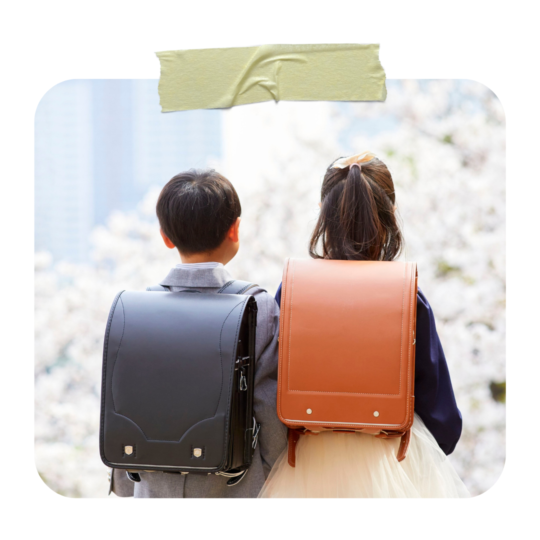 Japanese elementary school children carrying traditional randoseru school bags