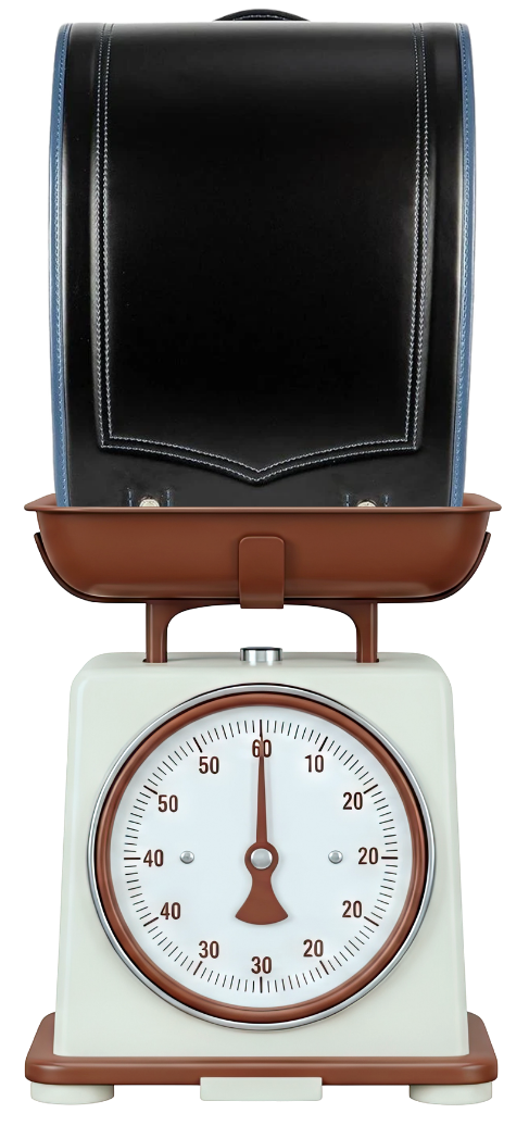 Black randoseru backpack on a scale showing its weight