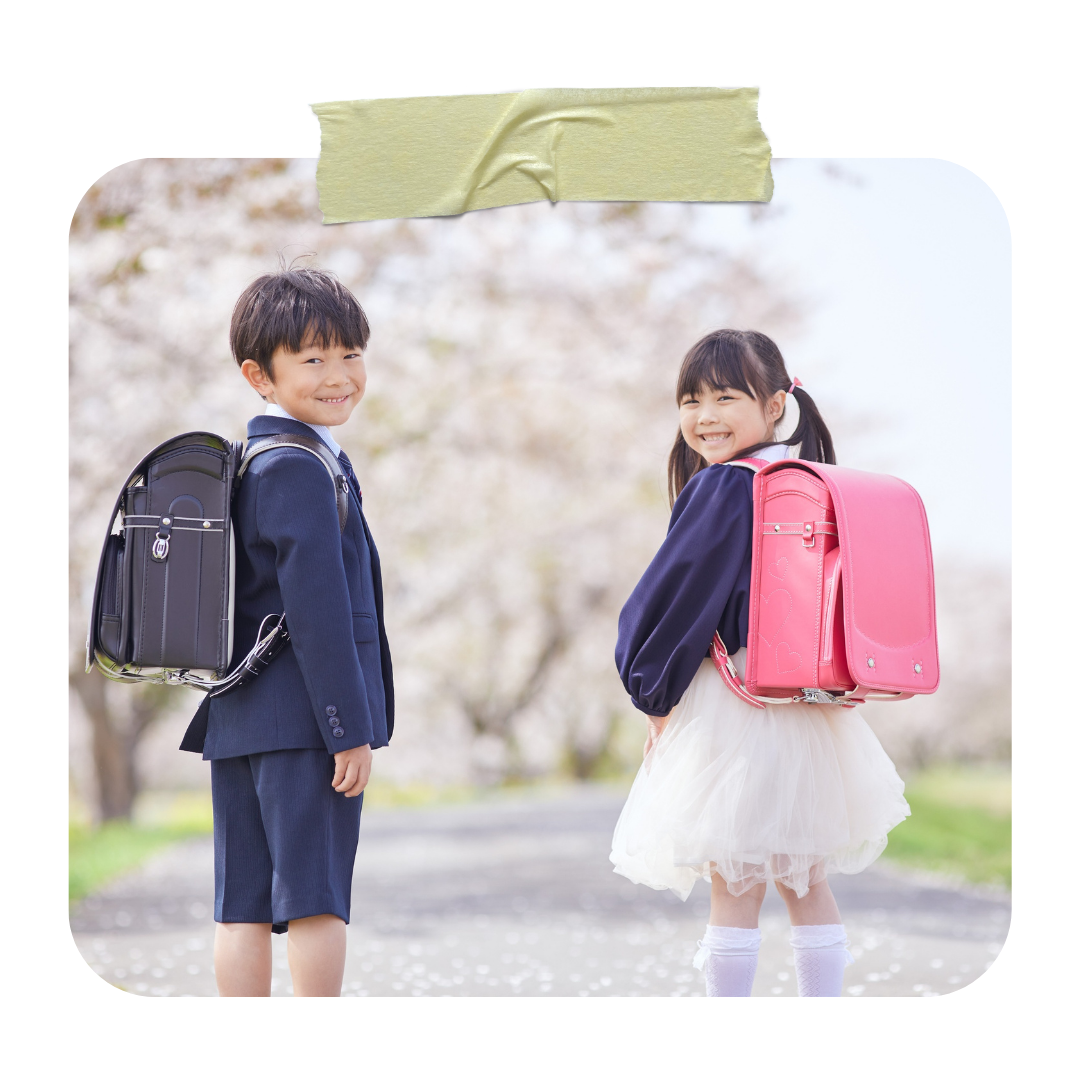 Japanese school children with black and pink randoseru backpacks